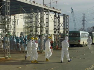 Zdjęcie pracowników Fukushima Daiichi. Fot. Gill Tudor / IAEA, CC BY-SA 2.0